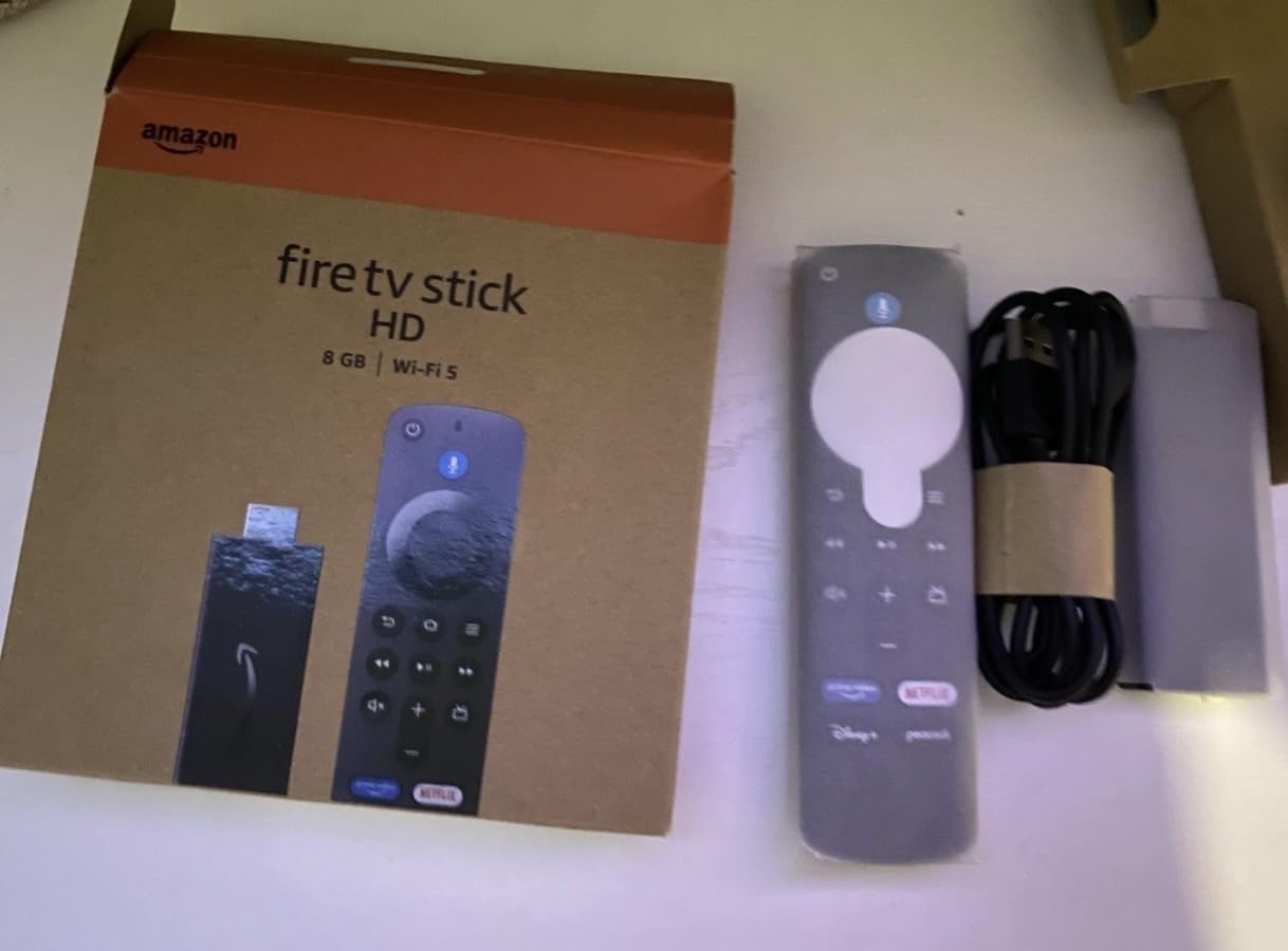 Fire TV Stick HD (newest model), free and live TV, Alexa Voice Remote, smart home controls, HD streaming customer photo 2