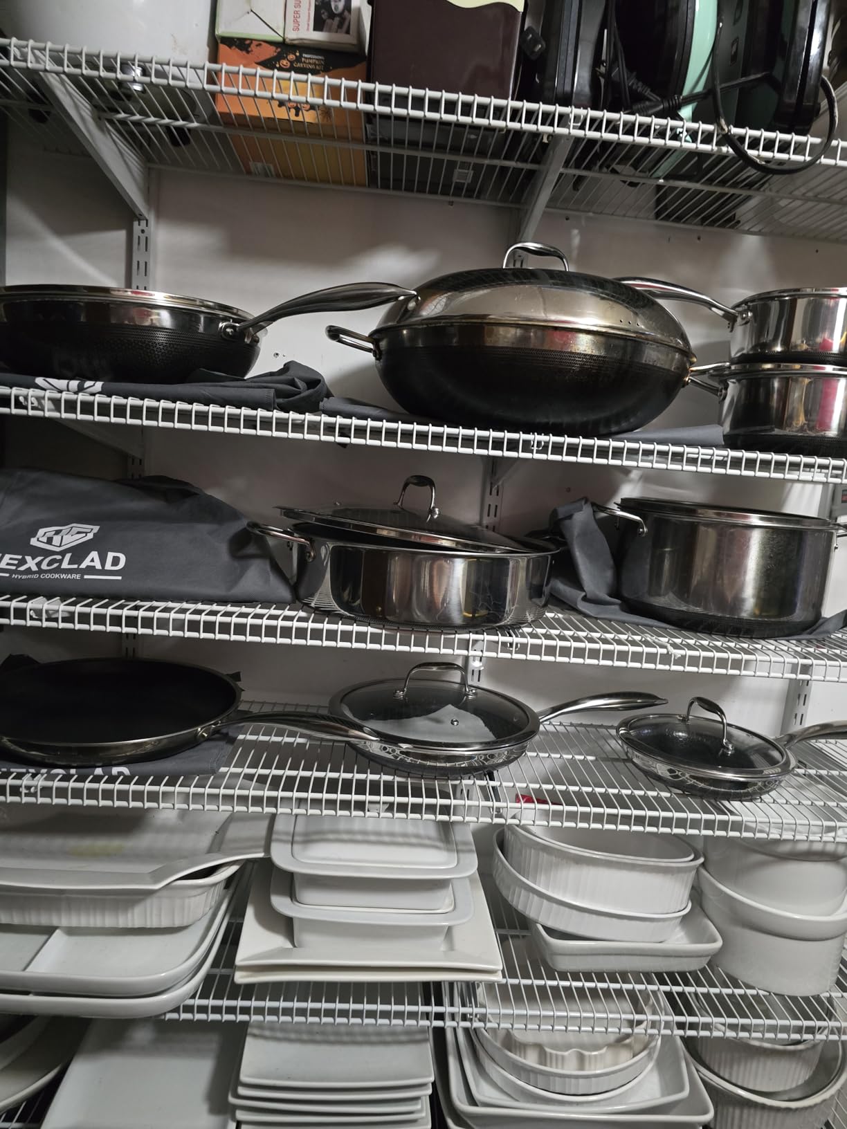 HexClad Hybrid Nonstick 14-Piece Cookware Set, 8, 10, and 12 Pans with Lids, 2, 3, and 8Qt Pots with Lids, and 2 Silicone Trivets, Stay-Cool Handles, Dishwasher and Oven-Safe, Induction Ready customer photo 1