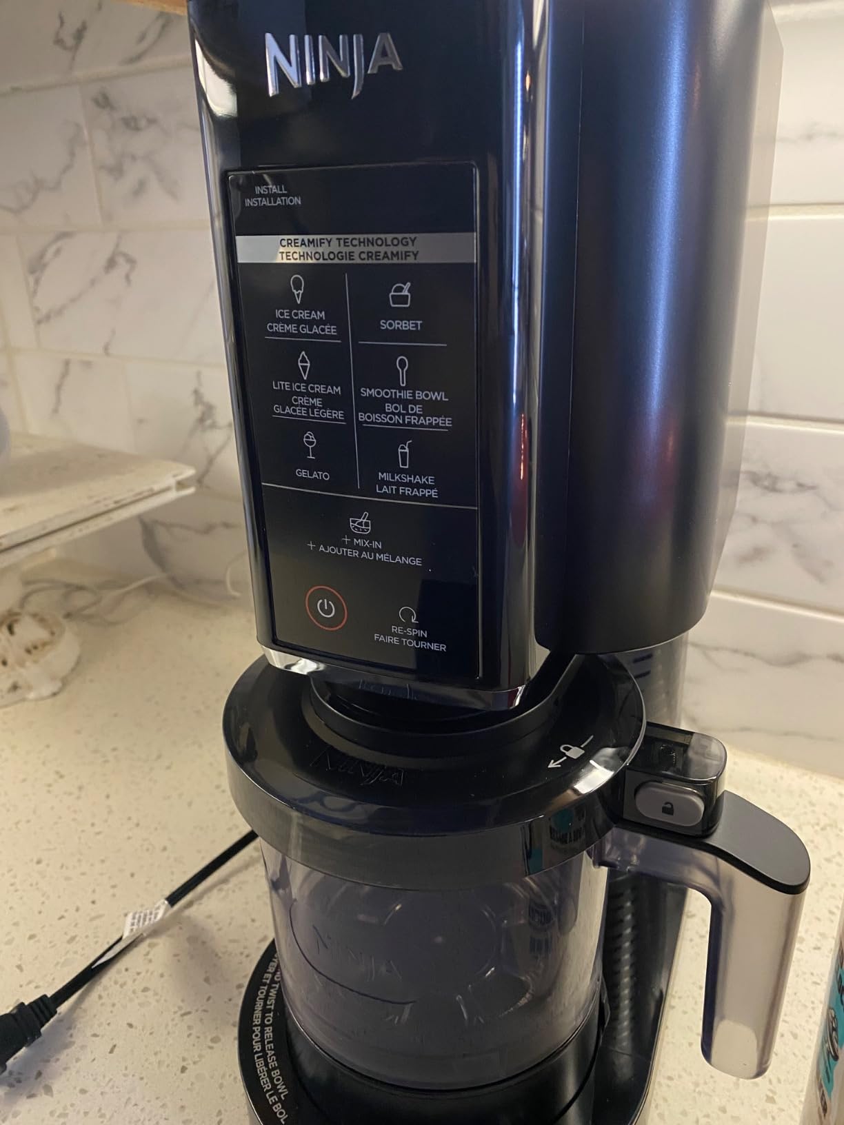 Ninja CREAMi Ice Cream, Sorbet, Milkshake Maker + 3 CREAMi Pints, Black customer photo 1