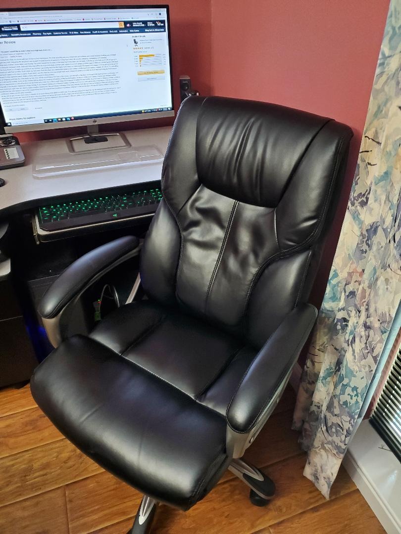 Amazon Basics Executive High Back Office Chair, Adjustable Height, Tilt, Swivel, Padded Seat, Bonded Leather, Wheels, Black/Silver customer photo 1