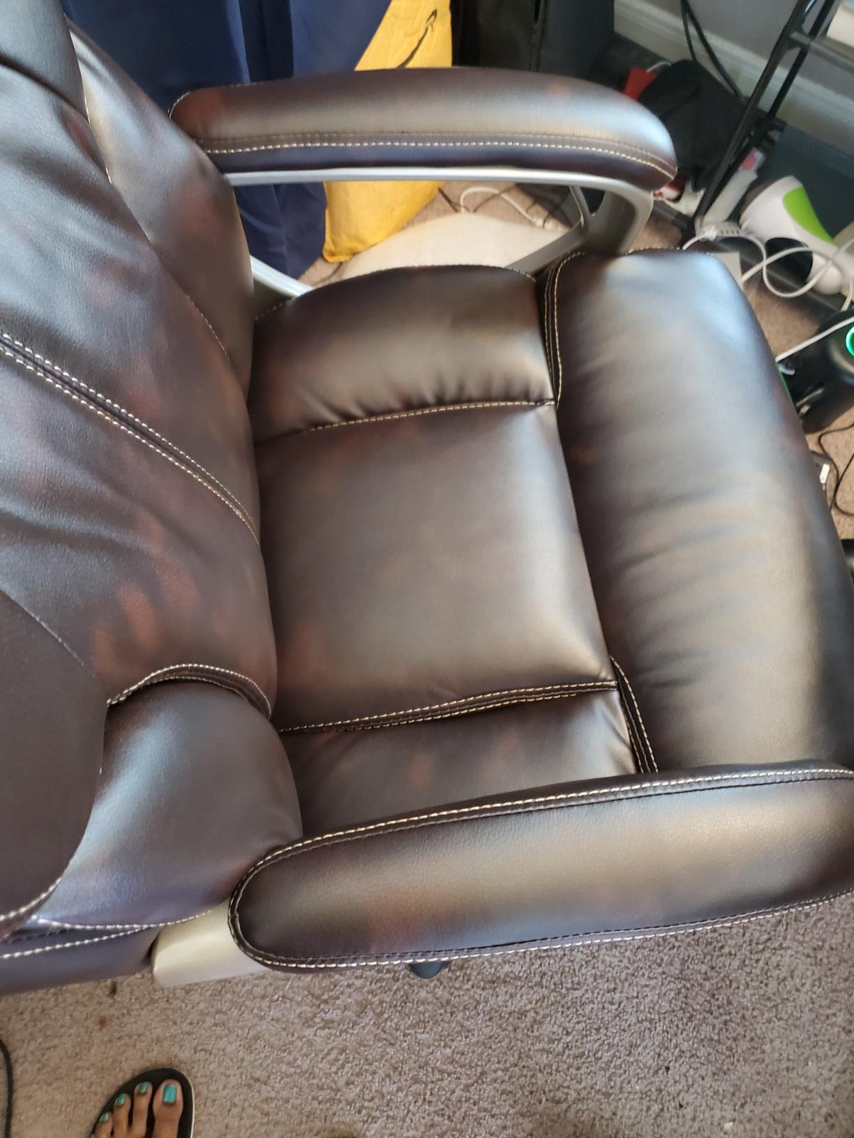 Amazon Basics Executive High Back Office Chair, Adjustable Height, Tilt, Swivel, Padded Seat, Bonded Leather, Wheels, Black/Silver customer photo 2