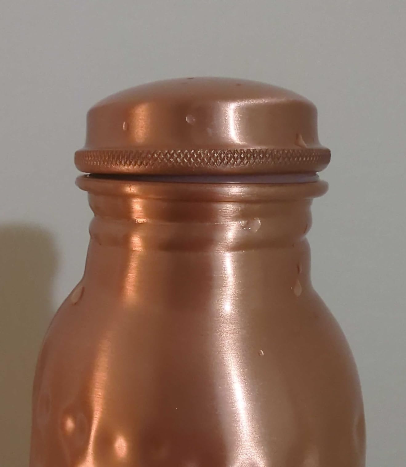 Kosdeg Copper Water Bottle - 34 Oz Extra Large - A Hammered Ayurvedic Pure Copper Vessel For Drinking customer photo 1