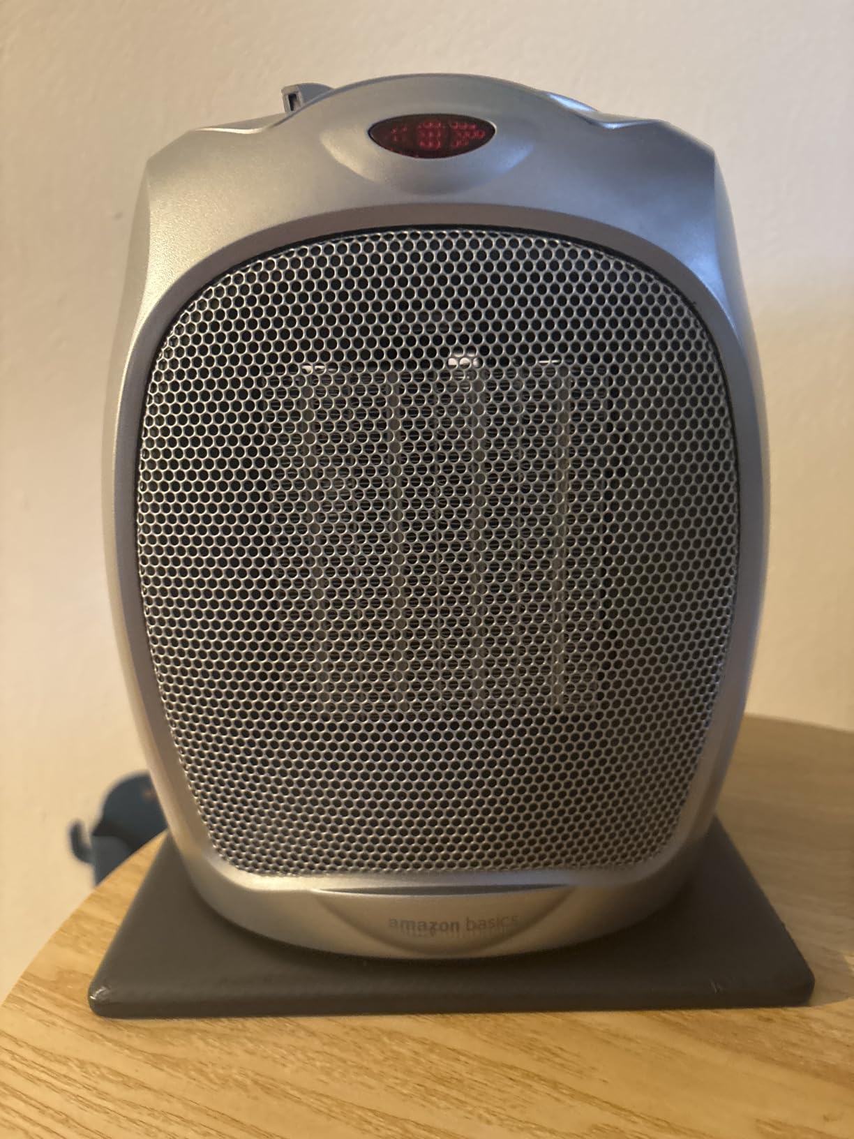 Amazon Basics Ceramic Space Heater, Portable Indoor Heating Solution, With Overheat and Tip-Over Protection, Thermostat, Non-Oscillating, 1500W, 7.52