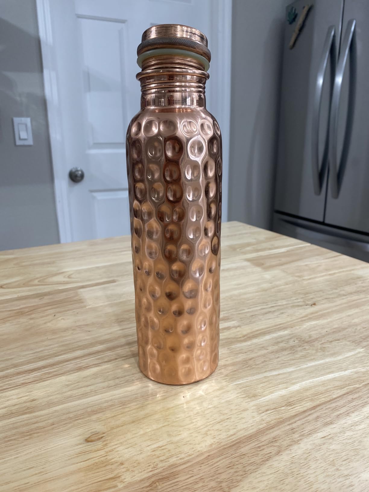 Kitchen Science Hammered Copper Water Bottle 34oz/1000ml with Carry Bag - Leak-Proof, Heavy Duty, Lab-Tested, Ayurvedic Bottle customer photo 1