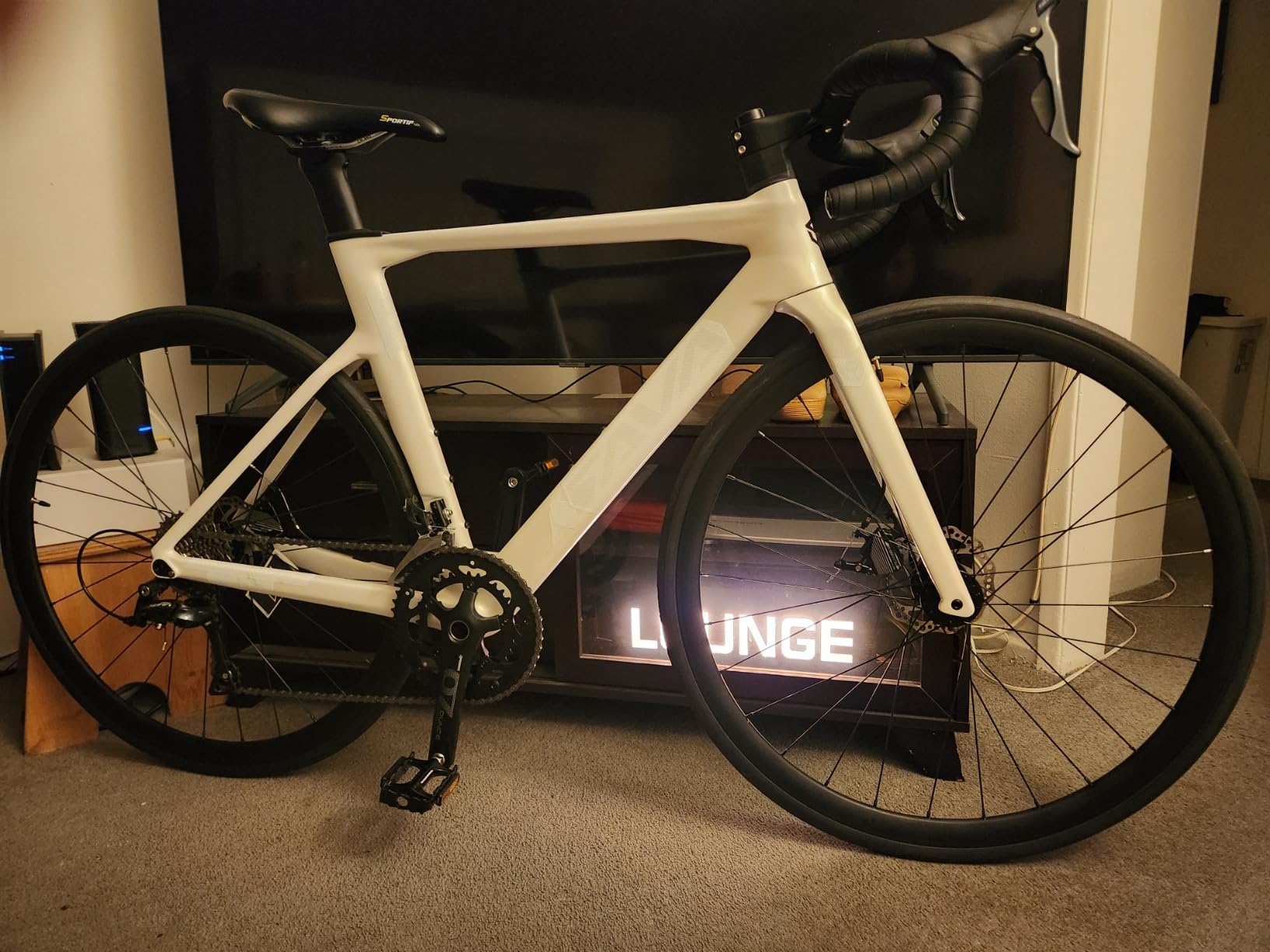 SAVADECK Carbon Disc Road Bike, Integrated Design Racing Bicycle Carbon Frame Carbon Fork with Shimano SORA R3000 Derailleur System 18 Speed Disc Brake Road Bike for Men or Women. customer photo 1