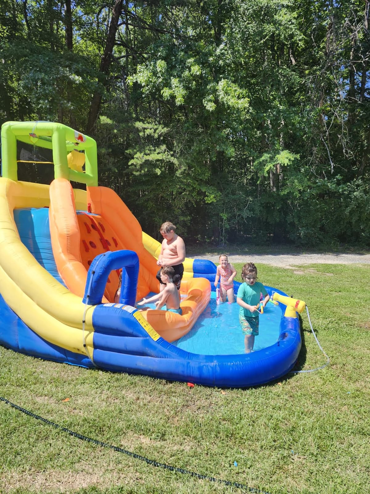 WELLFUNTIME Inflatable Water Slide, Bounce House with Water Bucket, Deep Pool, Climbing Wall with Rope, Bouncy Castle with Air Blower customer photo 2