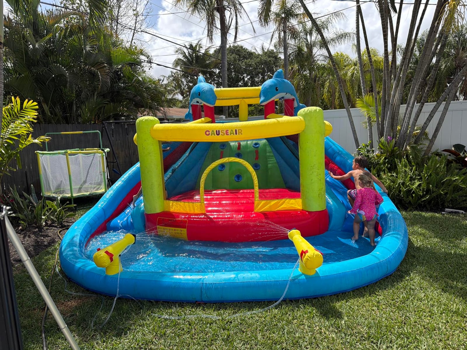 Causeair Inflatable Water Slide with Bounce House,Dolphin Styling,Splashing Pool,Double Water Cannon,Climbing Wall,Heavy Duty Air Blower,Inflatable Water Park Slide for Kids Backyard Summer customer photo 1
