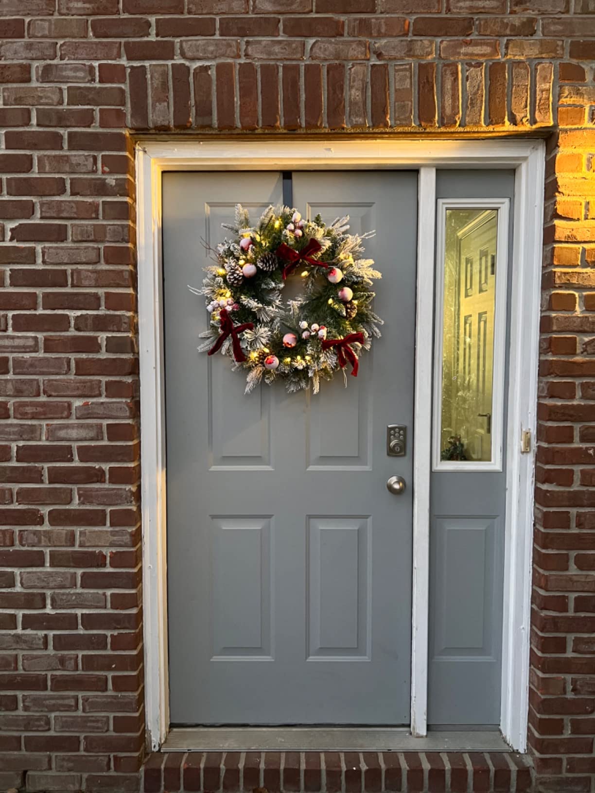 Pre-lit Snow Christmas Wreath with Red Balls,Berries and Bows,24 Inch 50 Battery Operated LED Lights,Holiday Decoration for Front Door Outdoor customer photo 1