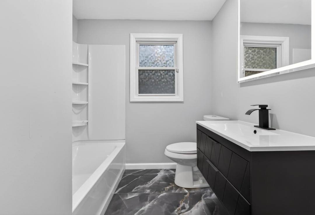 Matte Black Bathroom Faucet with Waterfall Spout and Pop-up Drain customer photo 1