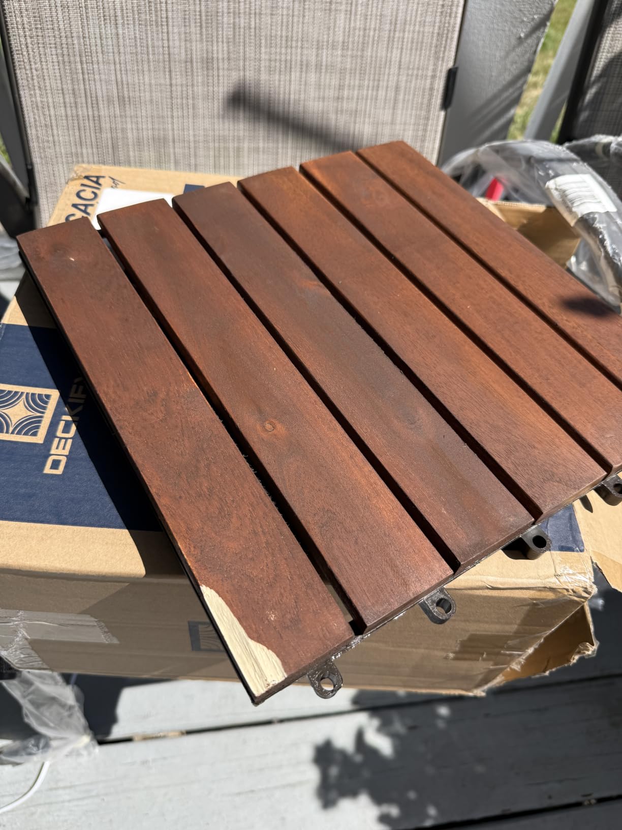 9-Piece Acacia Wood Interlocking Deck Tiles, Golden Teak Crossed customer photo 1