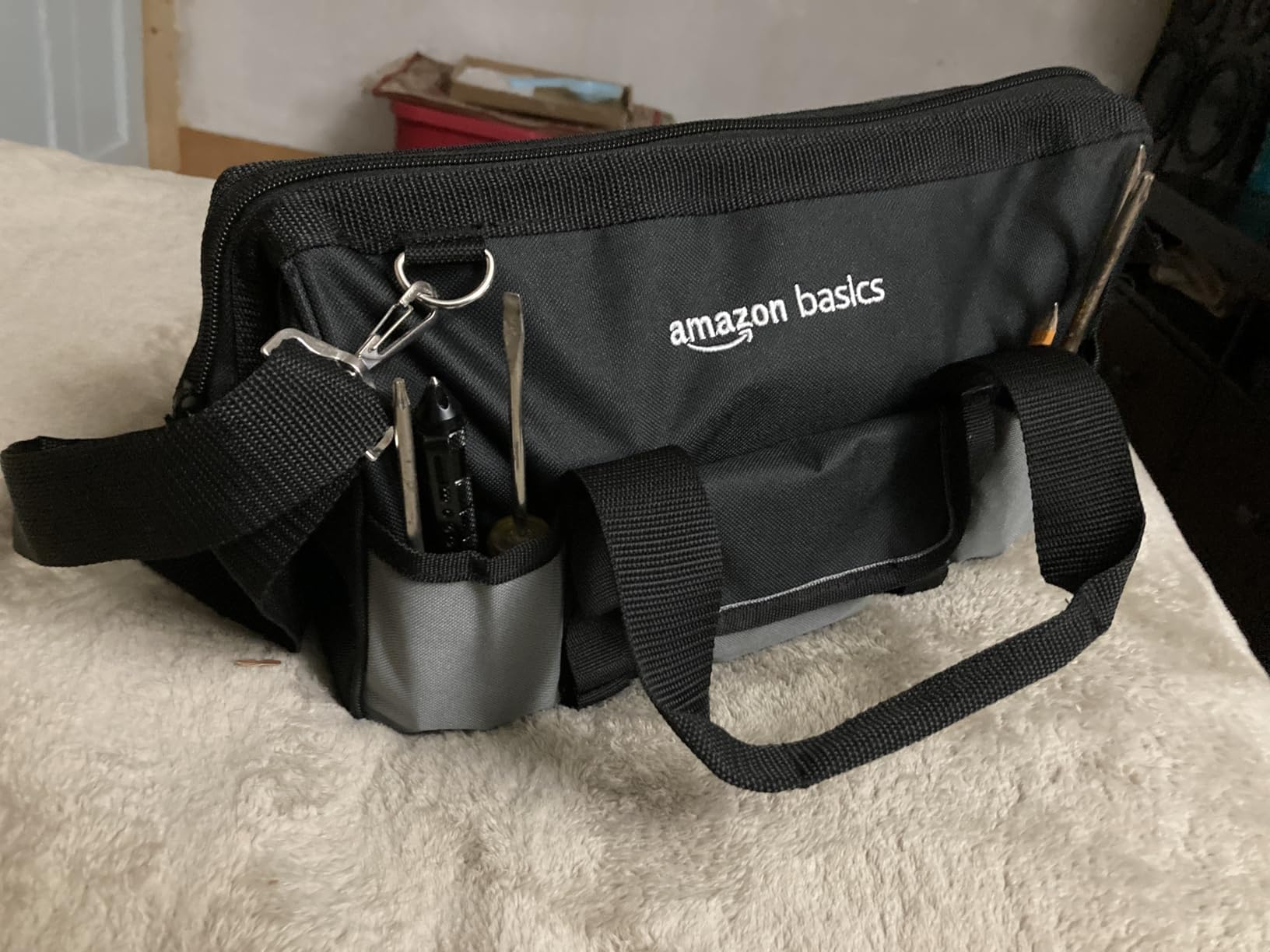 Amazon Basics Durable Wear-Resistant Tool Storage Bag with Adjustable Shoulder Strap, Portable Tool Organizer, 16 in, Black & Grey customer photo 1