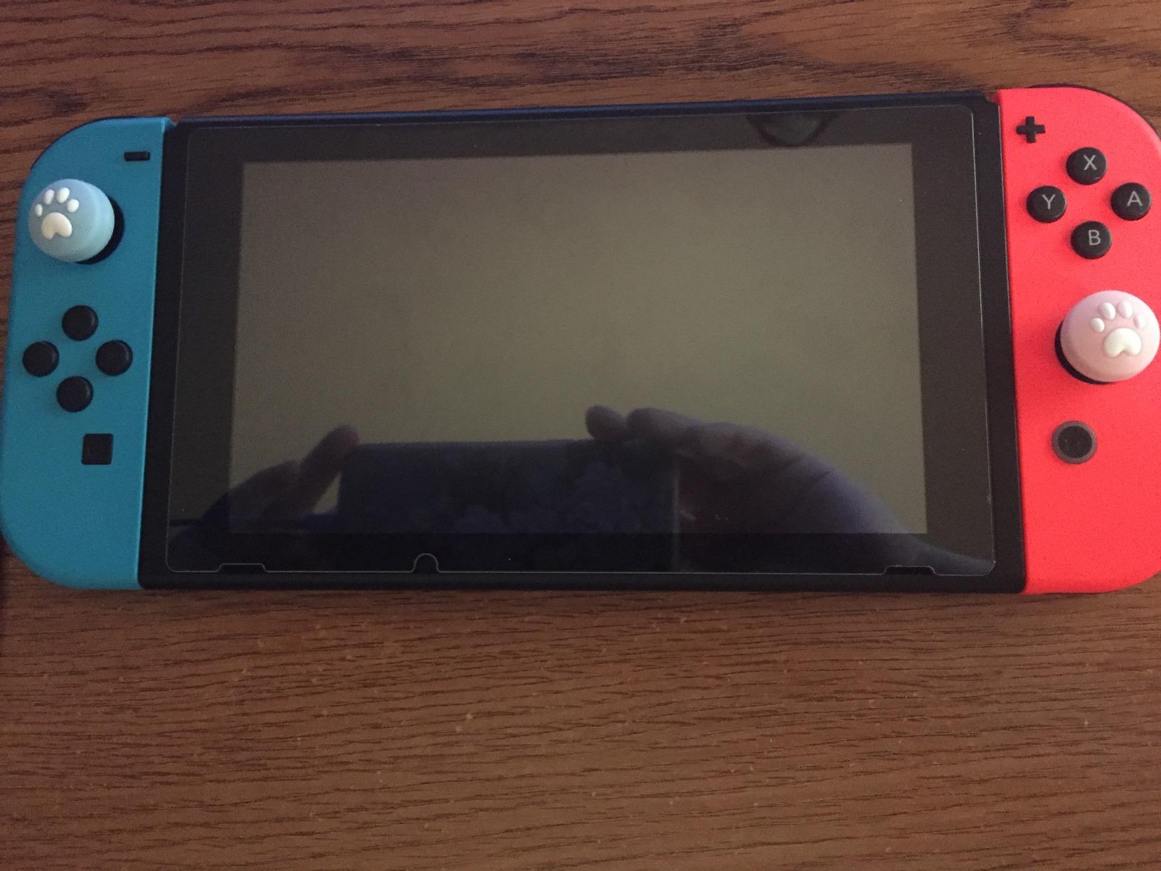Nintendo Switch with Neon Blue and Neon Red Joy‑Con customer photo 1