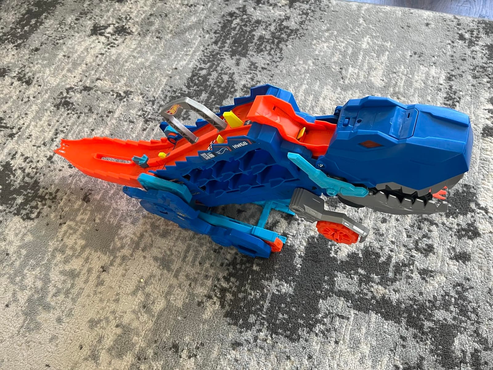 Hot Wheels City Toy Car Track Set, Ultimate T-Rex Transporter, Hauler Transforms into Stomping Dino with Race Track, from Netflix Series “Let’s Race” customer photo 1