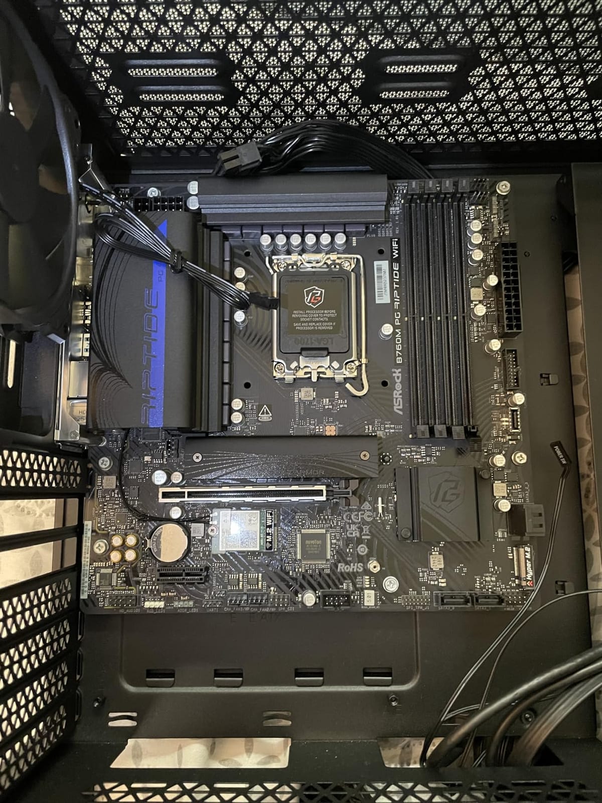 ASRock B760M PG Riptide WiFi Micro-ATX Motherboard | Supports 14th/13th/12th Gen Intel | DDR5 7200+ (OC) | WiFi 6E | 2.5G LAN | 14+1+1 Power Phase | Front & Rear USB-C customer photo 1